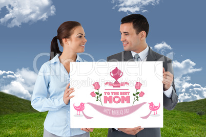 Composite image of young business partners presenting sign