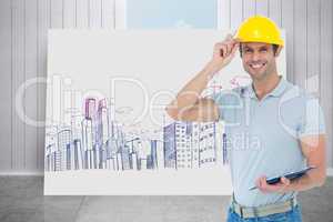 Composite image of architect wearing hard hat while holding clip