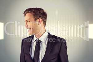 Composite image of young handsome businessman looking away