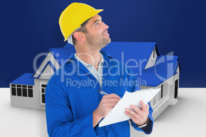 Composite image of male supervisor looking up while writing on c