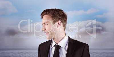 Composite image of young handsome businessman looking away