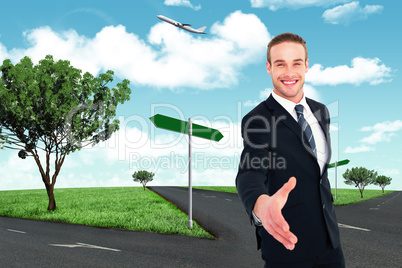 Composite image of businessman smiling and offering his hand