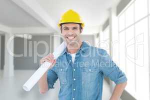 Composite image of confident architect holding rolled blueprint