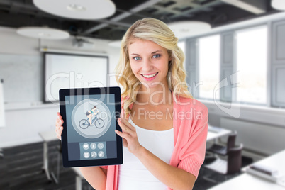 Composite image of young pretty student showing tablet pc