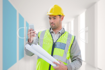 Composite image of architect on the phone