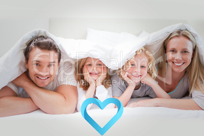 Composite image of family under the cover