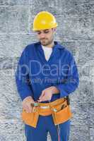 Composite image of male electrician cutting wires