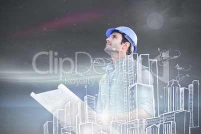 Composite image of architect with blueprint