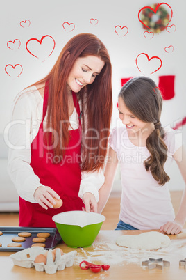 Composite image of festive mother and daughter baking together