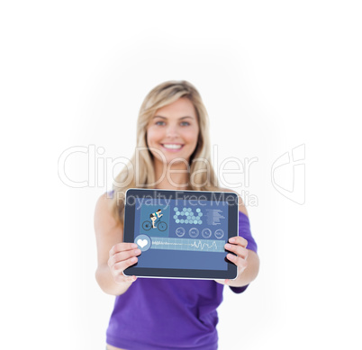 Composite image of tablet computer being held by a blonde woman