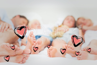 Composite image of close up of the feet of a family