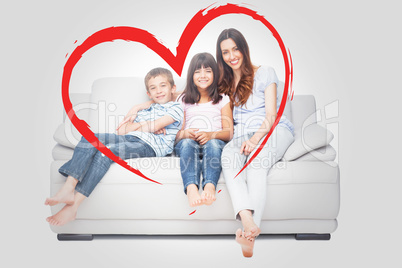 Composite image of mother with their children sitting on sofa