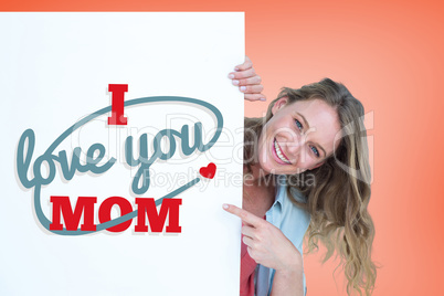 Composite image of woman holding poster