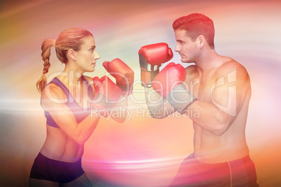 Composite image of boxing couple