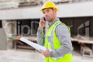 Composite image of architect on the phone