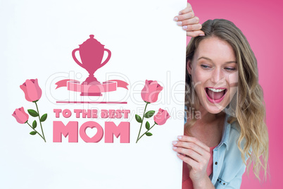 Composite image of woman holding poster