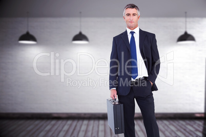 Composite image of businessman crossing finish line and cheering