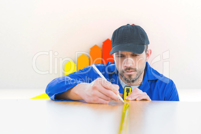 Composite image of worker measuring table