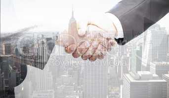 Composite image of handshake between two business people