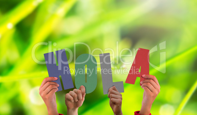 Composite image of hands holding up hola