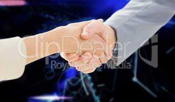 Composite image of closeup of shaking hands after business meeti