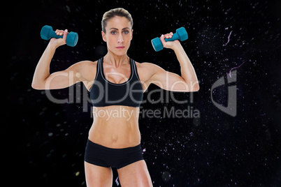 Composite image of female bodybuilder holding two dumbbells with