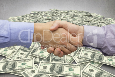 Composite image of hand shake in front of wires Composite image of hand shake in front of wires