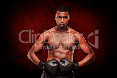 Composite image of muscular boxer