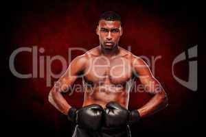 Composite image of muscular boxer