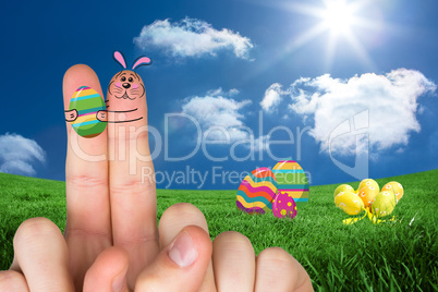 Composite image of fingers as easter bunny