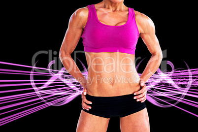 Composite image of female bodybuilder posing with hands on hips