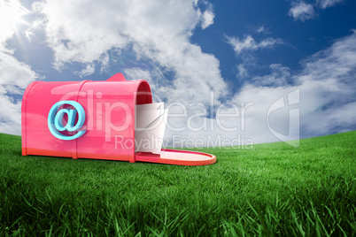 Composite image of red email postbox