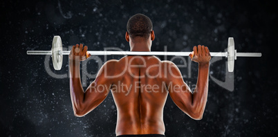 Composite image of rear view of a fit shirtless man lifting barb