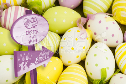 Composite image of easter egg hunt sign