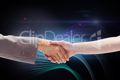 Composite image of handshake between two women