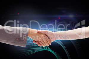 Composite image of handshake between two women