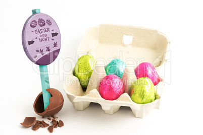 Composite image of easter egg hunt sign