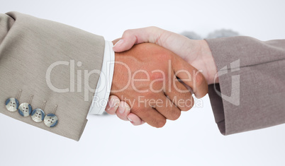 Composite image of side view of business peoples hands shaking