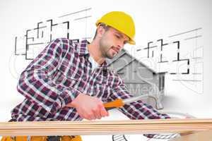 Composite image of handyman using hammer on wood