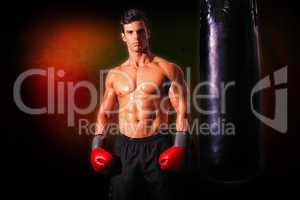 Composite image of muscular boxer