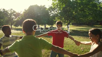 Children playing in park, happy young people, kids, friends