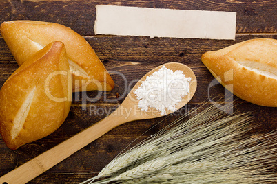 Bakery products flour in a wooden spoon