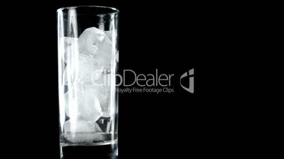 Melting ice cubes in glass