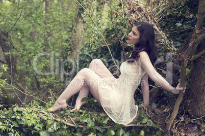 Sensual Woman in Dress Posing at the Woods