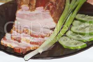 fresh cooked meat with spring onions