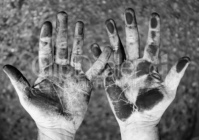 dirty hands on black and white