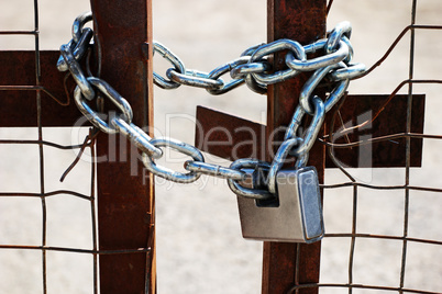 Padlock and chain on a gate