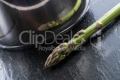 Green asparagus in the pot