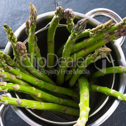 Green asparagus in the pot