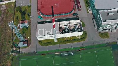 Aerial View of School Team Playing Football, sunny day